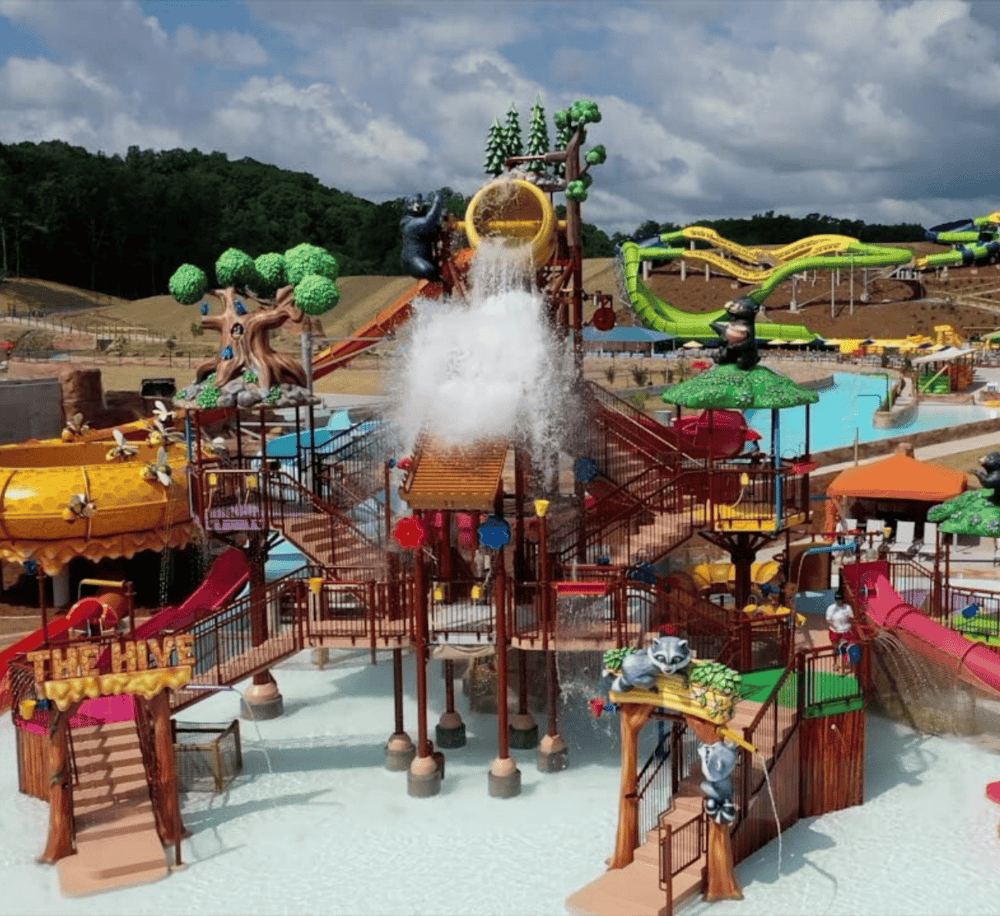 Water park with water slides and themed attractions for family fun.
