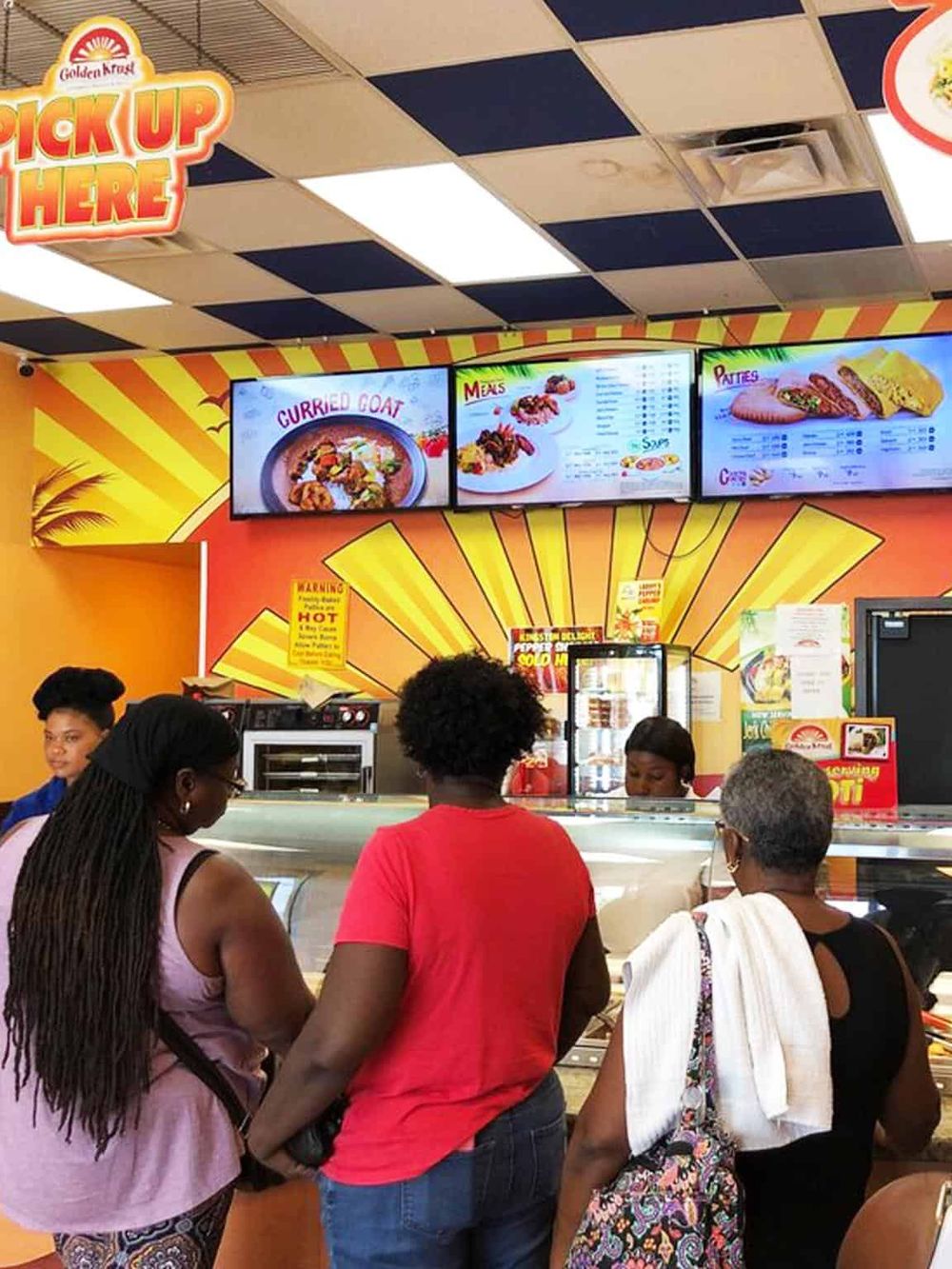 Enjoy quick service at QuestForDirections fast-food restaurant with digital menu displays.