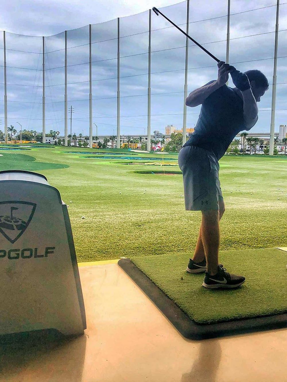 Golf driving range workout for better swing and accuracy at QuestForDirections golf training center.