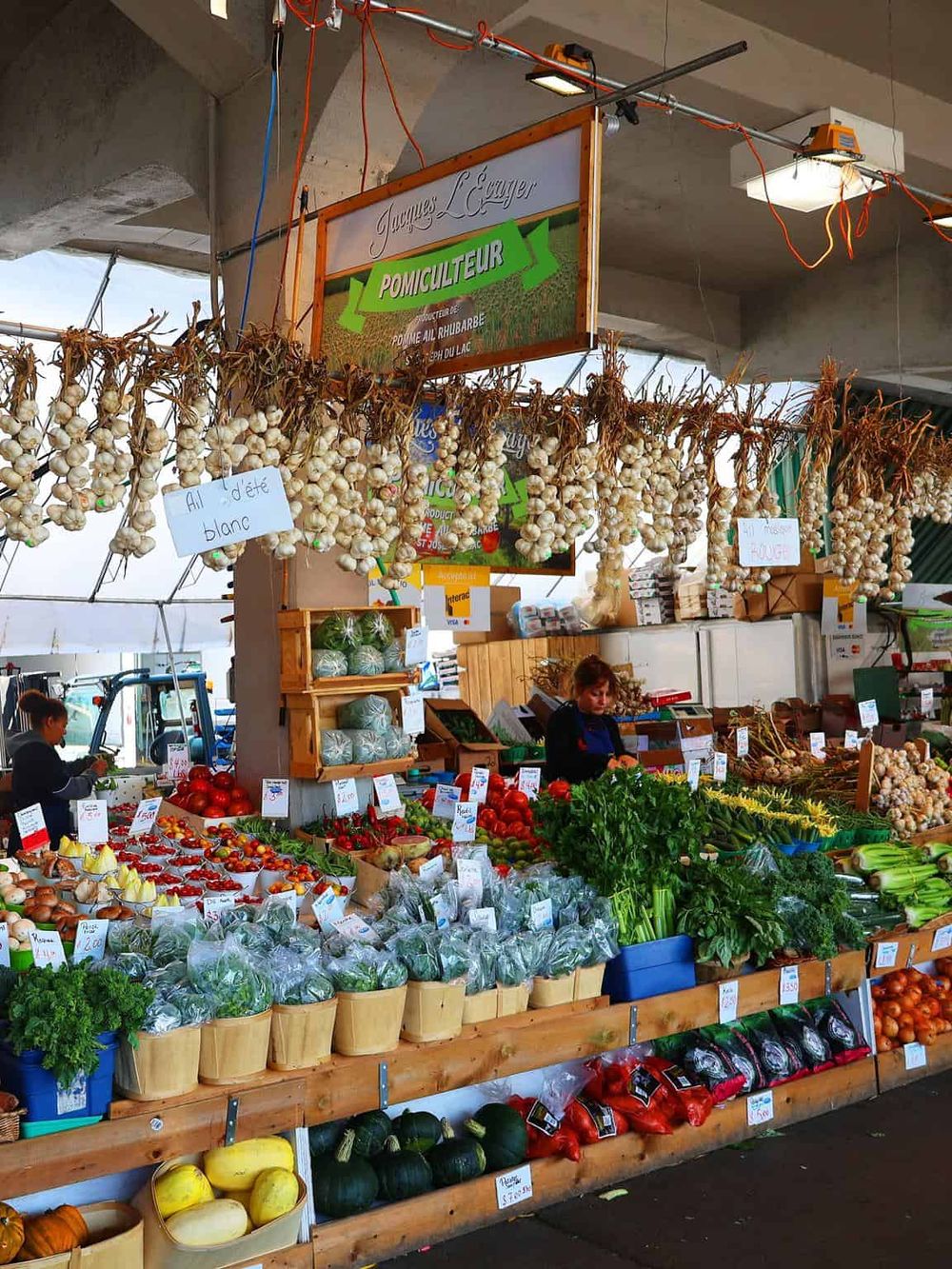 Fresh market vegetables and fruits at a local farm stand for healthy shopping.