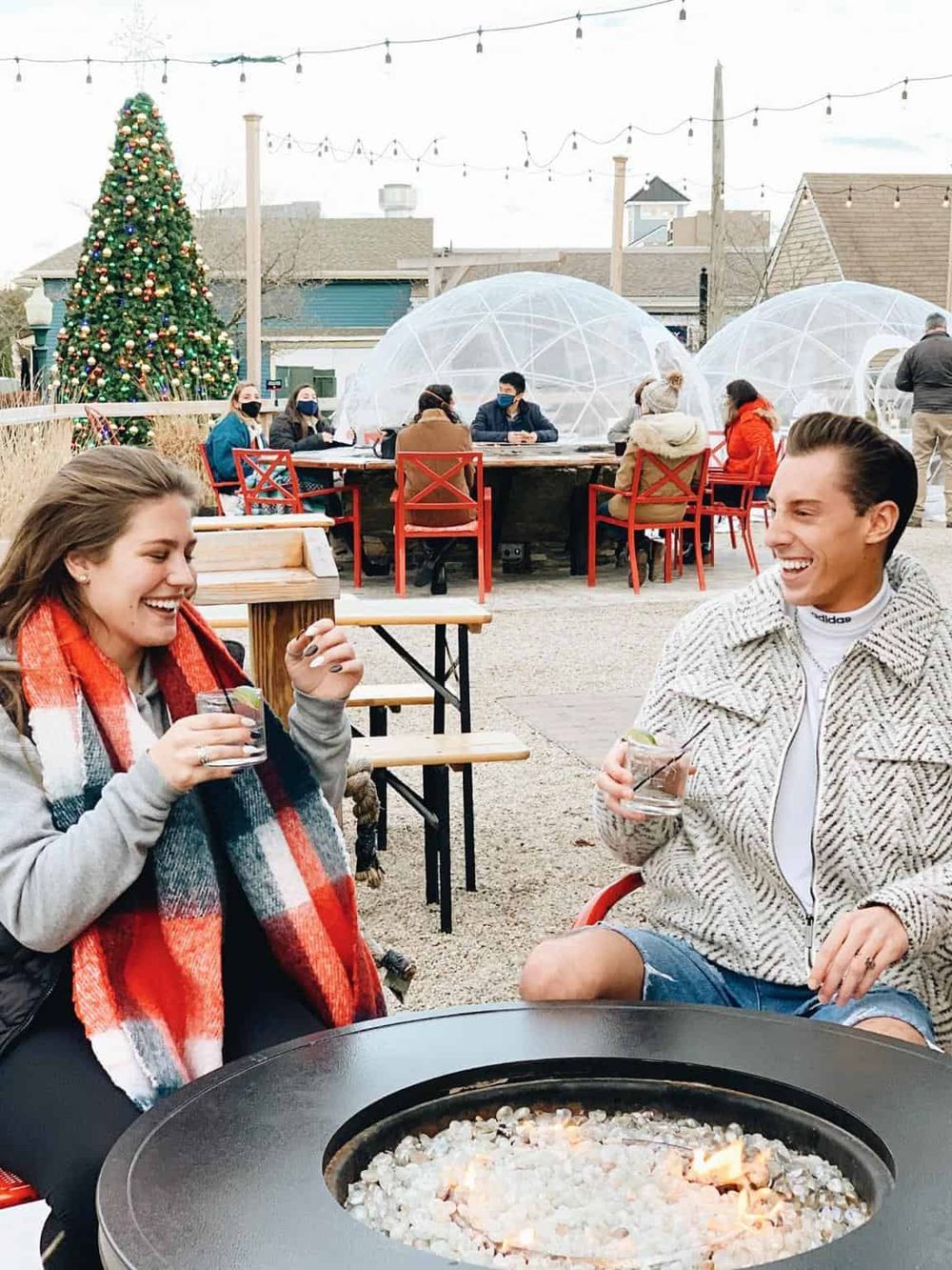 Enjoying outdoor holiday festivities with friends at QuestForDirections Christmas event.