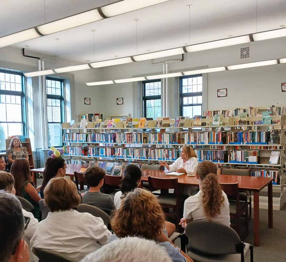 Accessible library event with a speaker and audience at QuestForDirections.