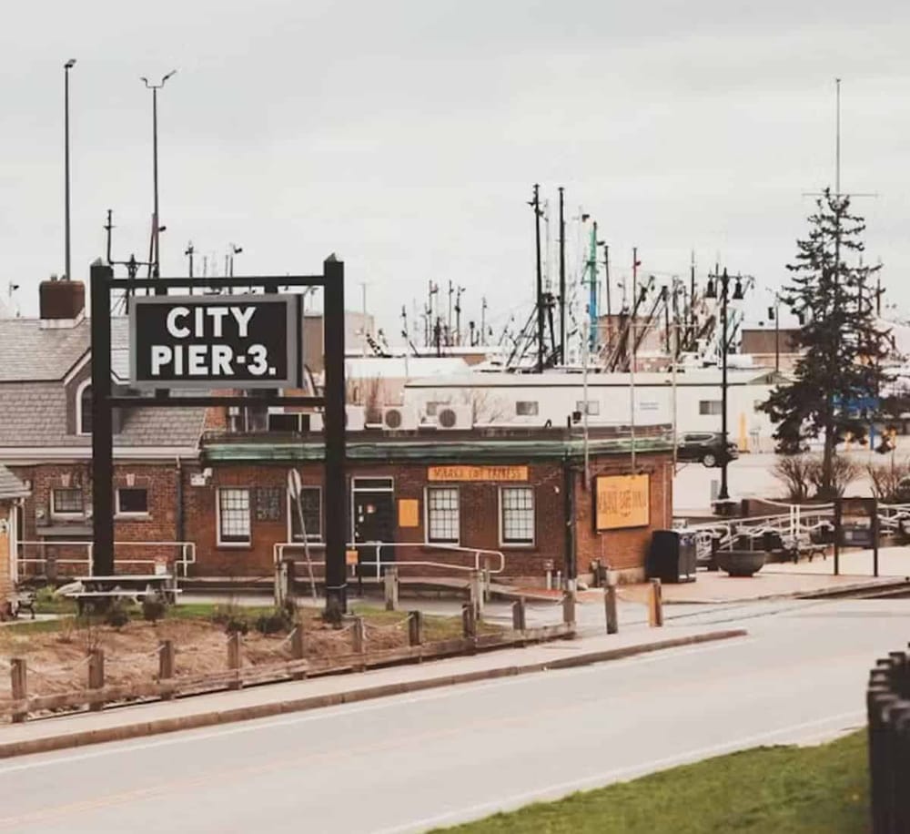Historic city pier at QuestForDirections, showcasing waterfront transportation and scenic views.