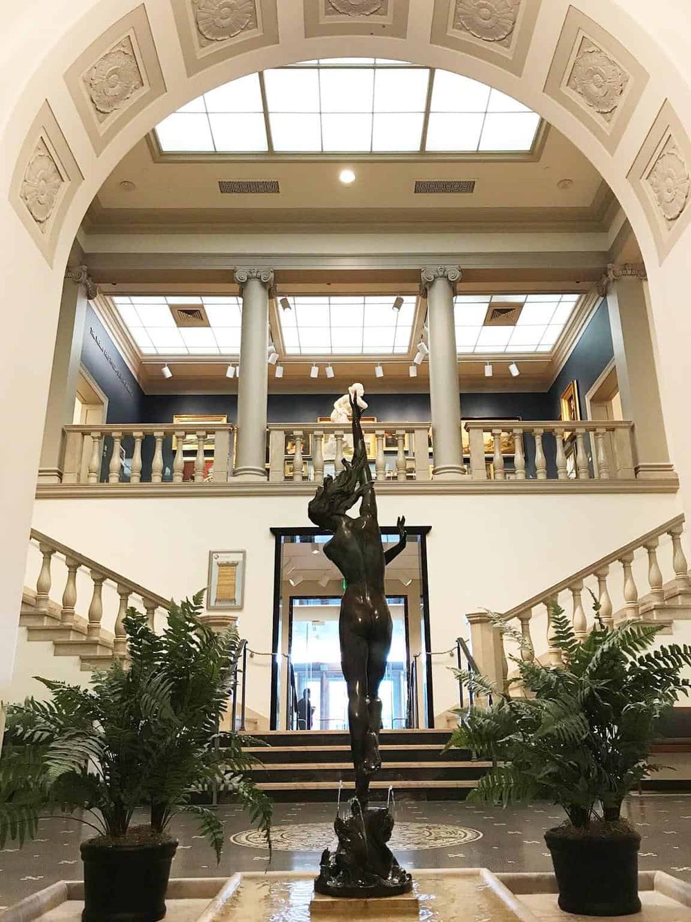 Elegant lobby art sculpture at Quest For Directions, enhancing luxury interior design.