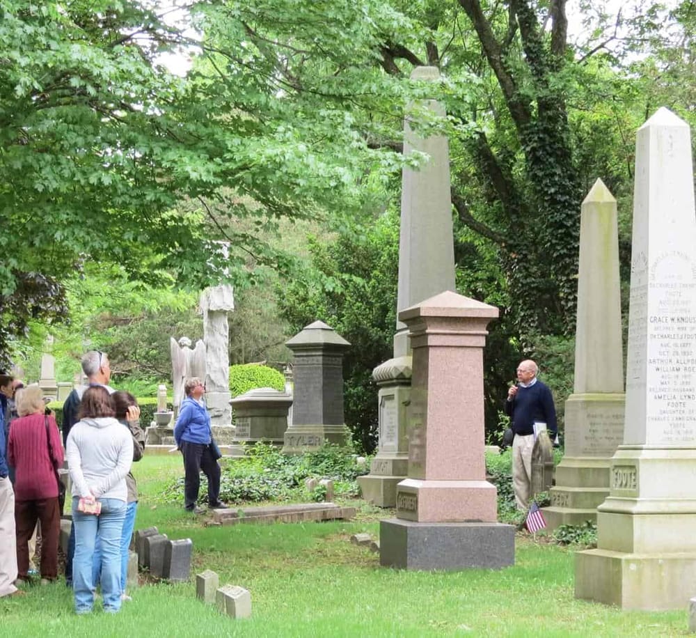 Gravestone tour at historic cemetery for guided cemetery tours and local heritage exploration.