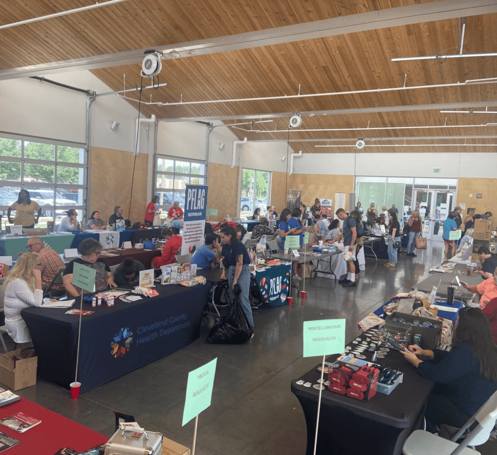 Accessible health and community resource fair in Cleveland, Ohio with various booths and attendees.