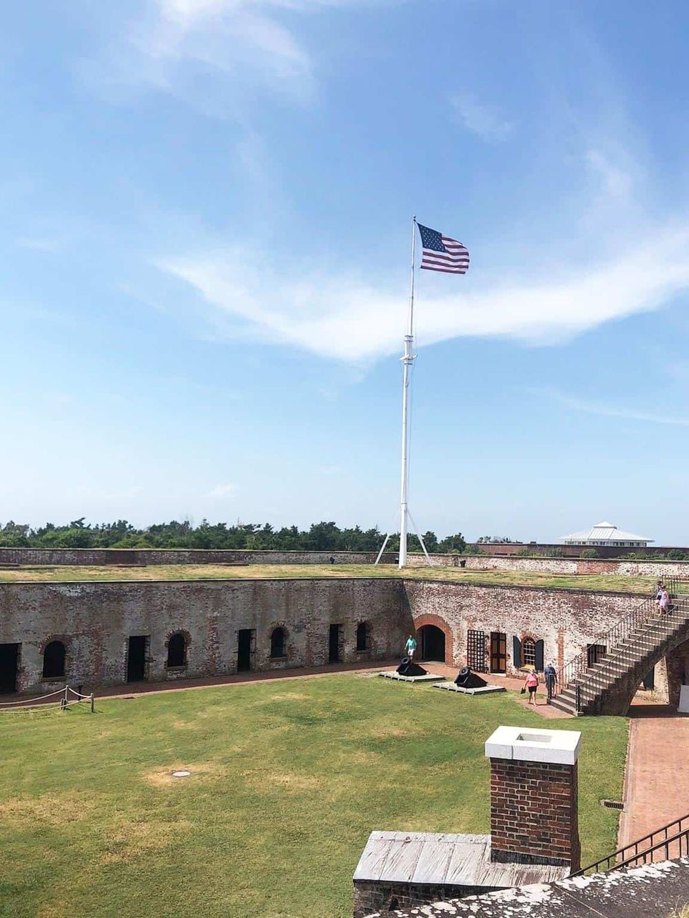 American flag at historic Fort McHenry, Baltimore, symbol of U.S. patriotism and national history.