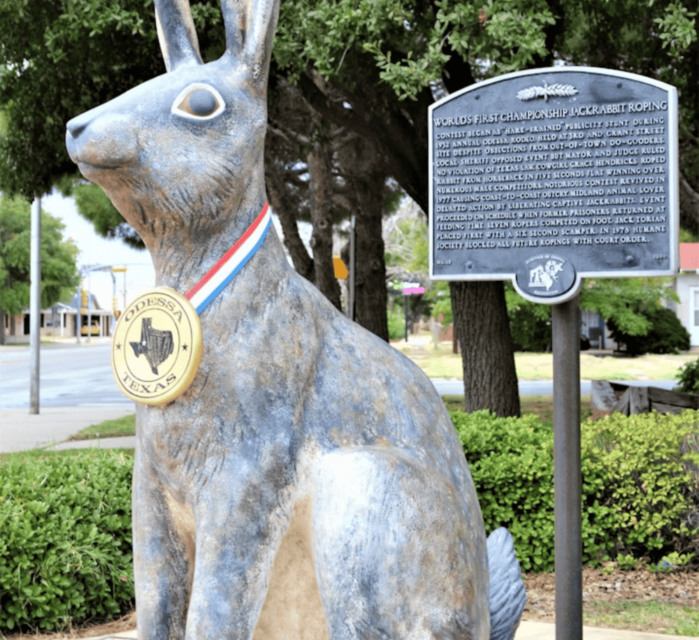 - Bronze jackrabbit sculpture with championship medal in Odessa, Texas, celebrating local history.