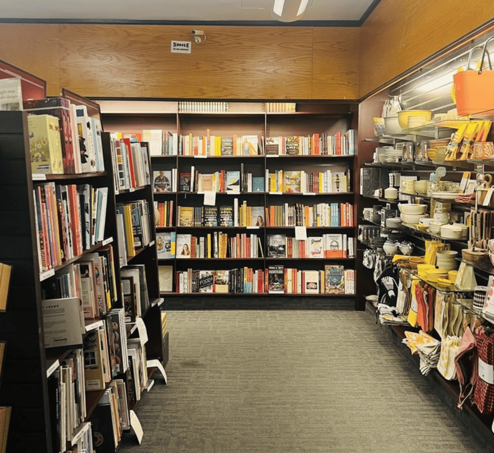 Bookshelf filled with books at QuestForDirections bookstore.
