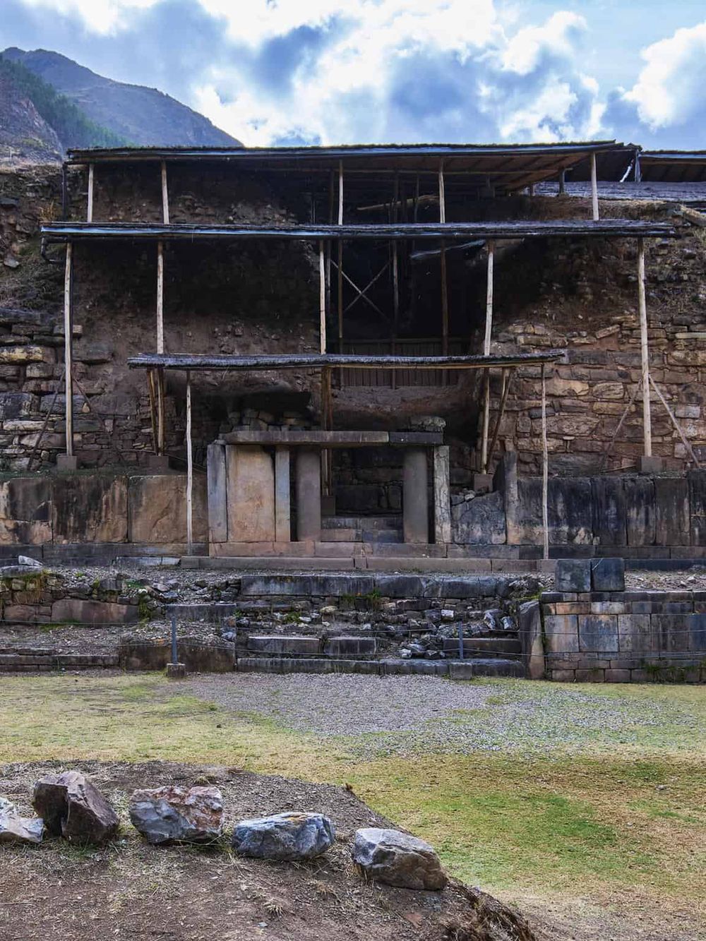 Ancient Incan site with archaeological structures in Cusco, Peru, showcasing historical ruins and scenic mountain views.