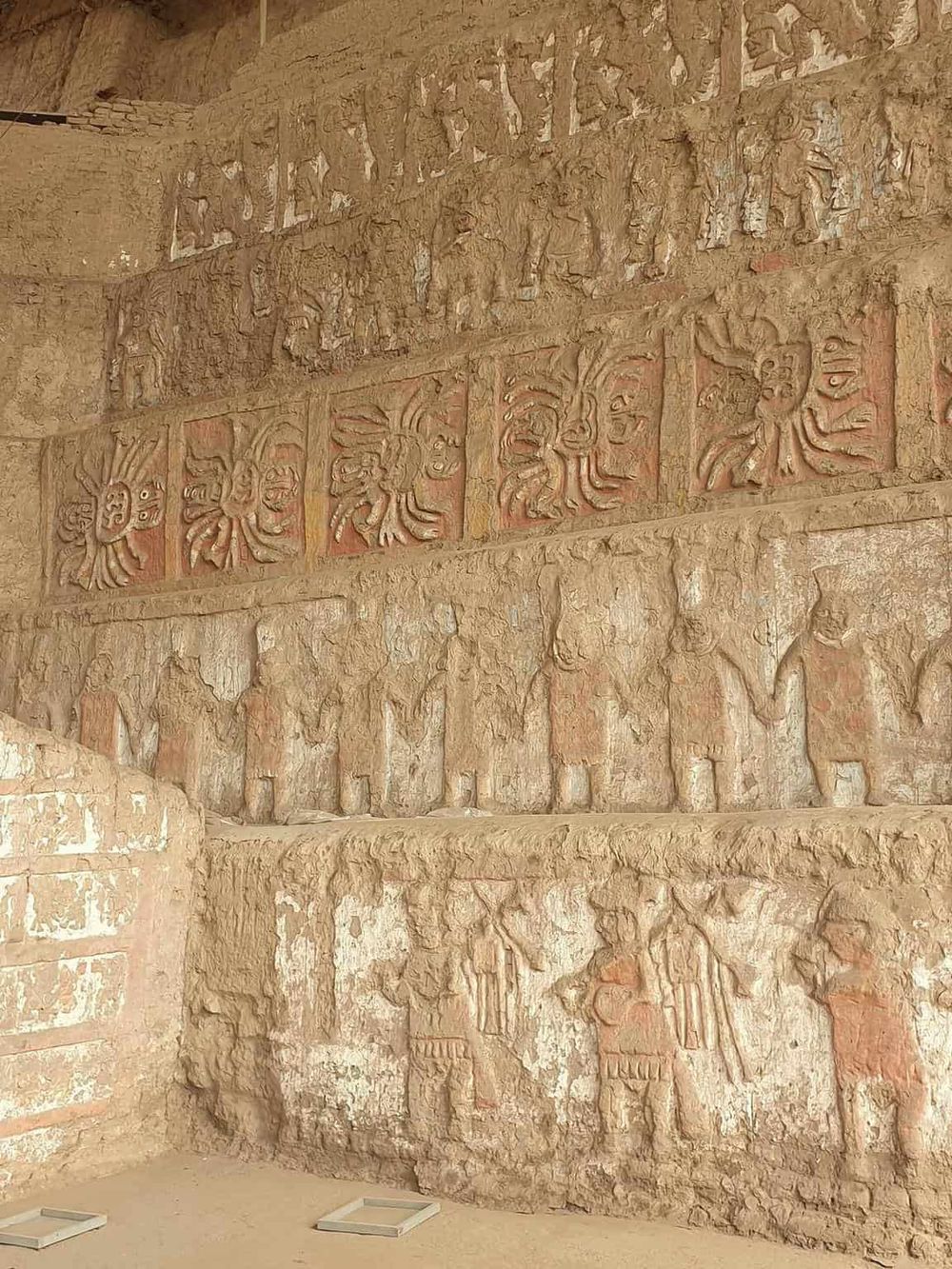 Ancient Mayan murals depicting historical figures and mythological scenes at Quest for Directions archaeological site.