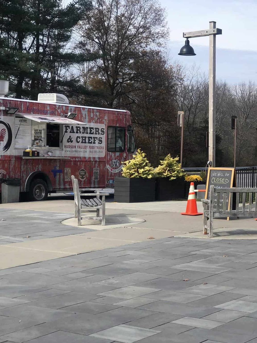 Food truck at an outdoor event in Hudson Valley, offering local cuisine and fresh ingredients.