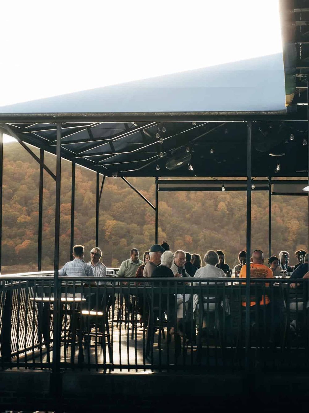 Outdoor rooftop dining with scenic mountain views at QuestForDirections.