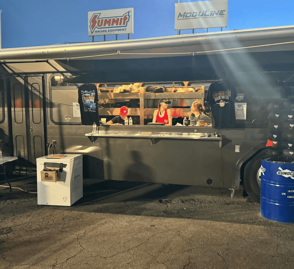 A racing event food truck serving drinks and snacks at QuestForDirections.