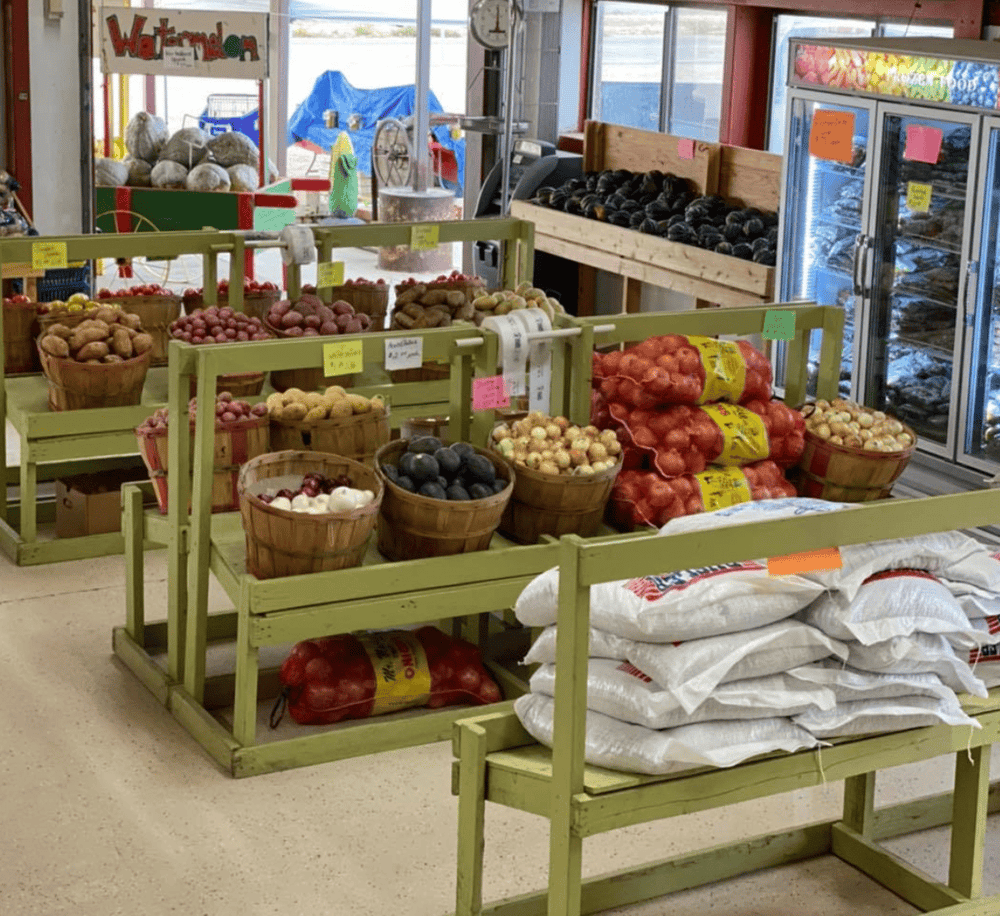 Fresh produce and vegetables at local farm market for healthy eating and grocery shopping.