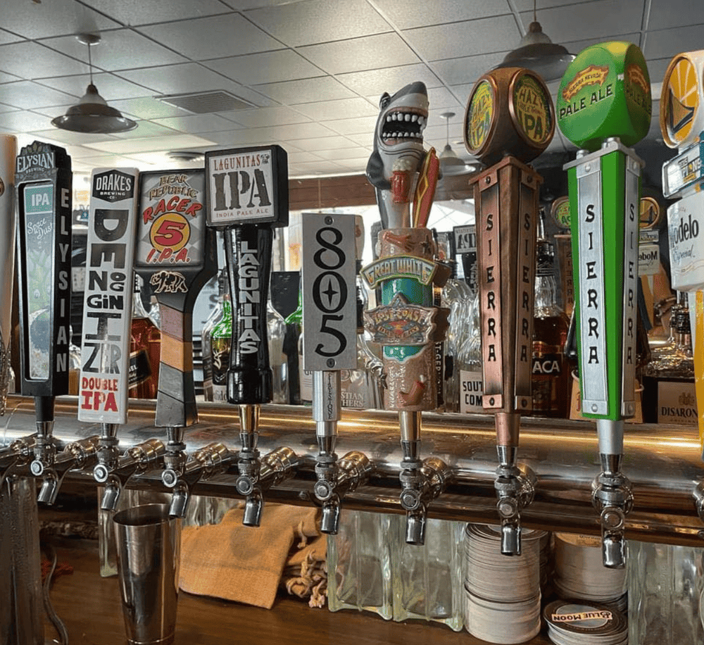 1. colorful beer tap handles with various craft beer labels and designs.