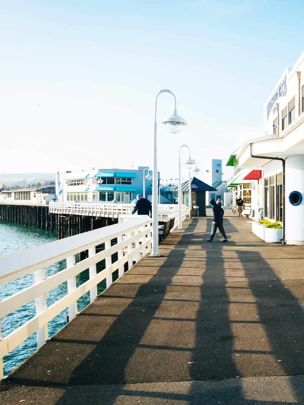 Pierside waterfront shopping and dining with iconic buildings in Santa Barbara, California.