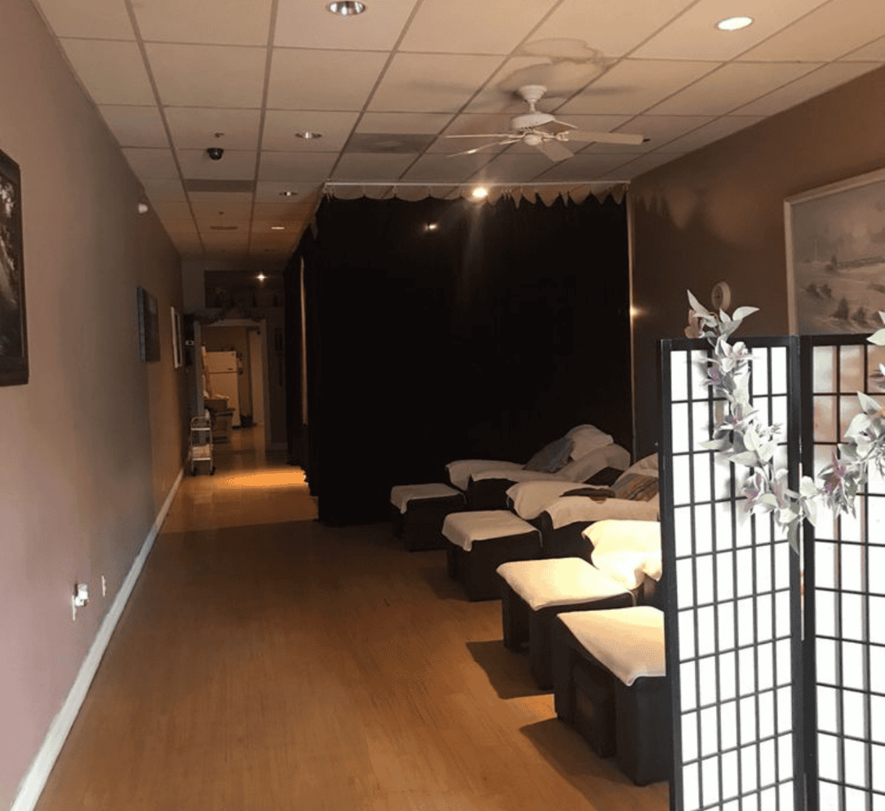 Relaxing spa lounge with massage chairs at QuestForDirections wellness center.