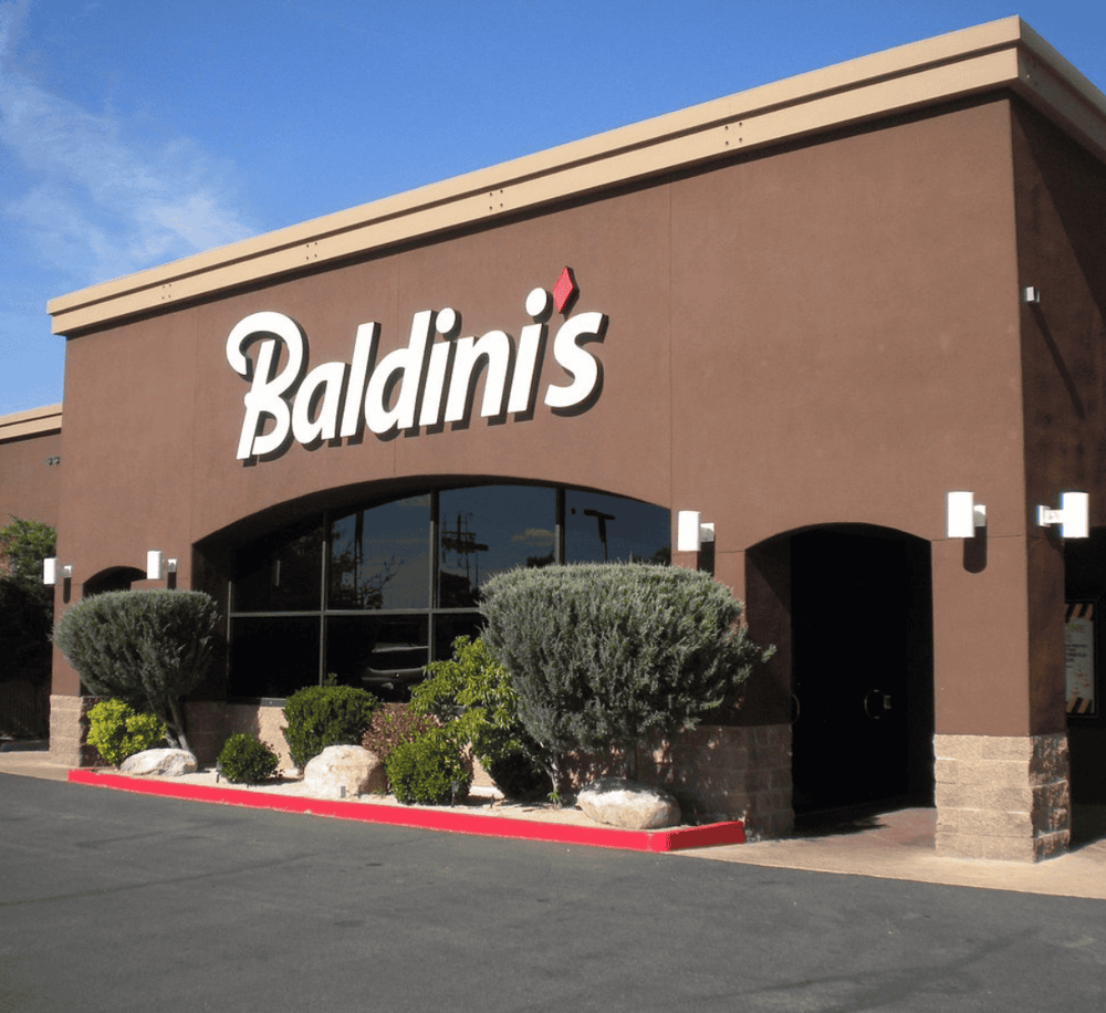 Modern Baldini's restaurant exterior with landscaping and clear signage.