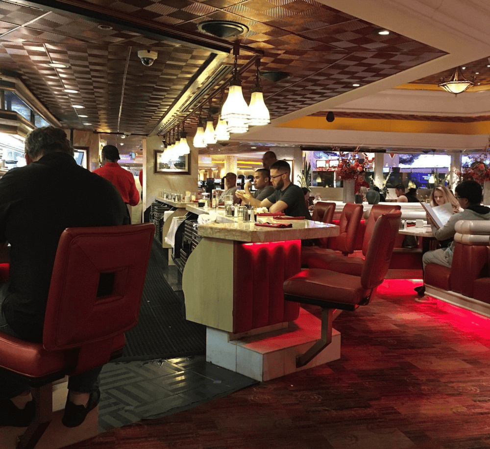 Elegant downtown restaurant with modern decor and cozy ambiance for dining and social gatherings.