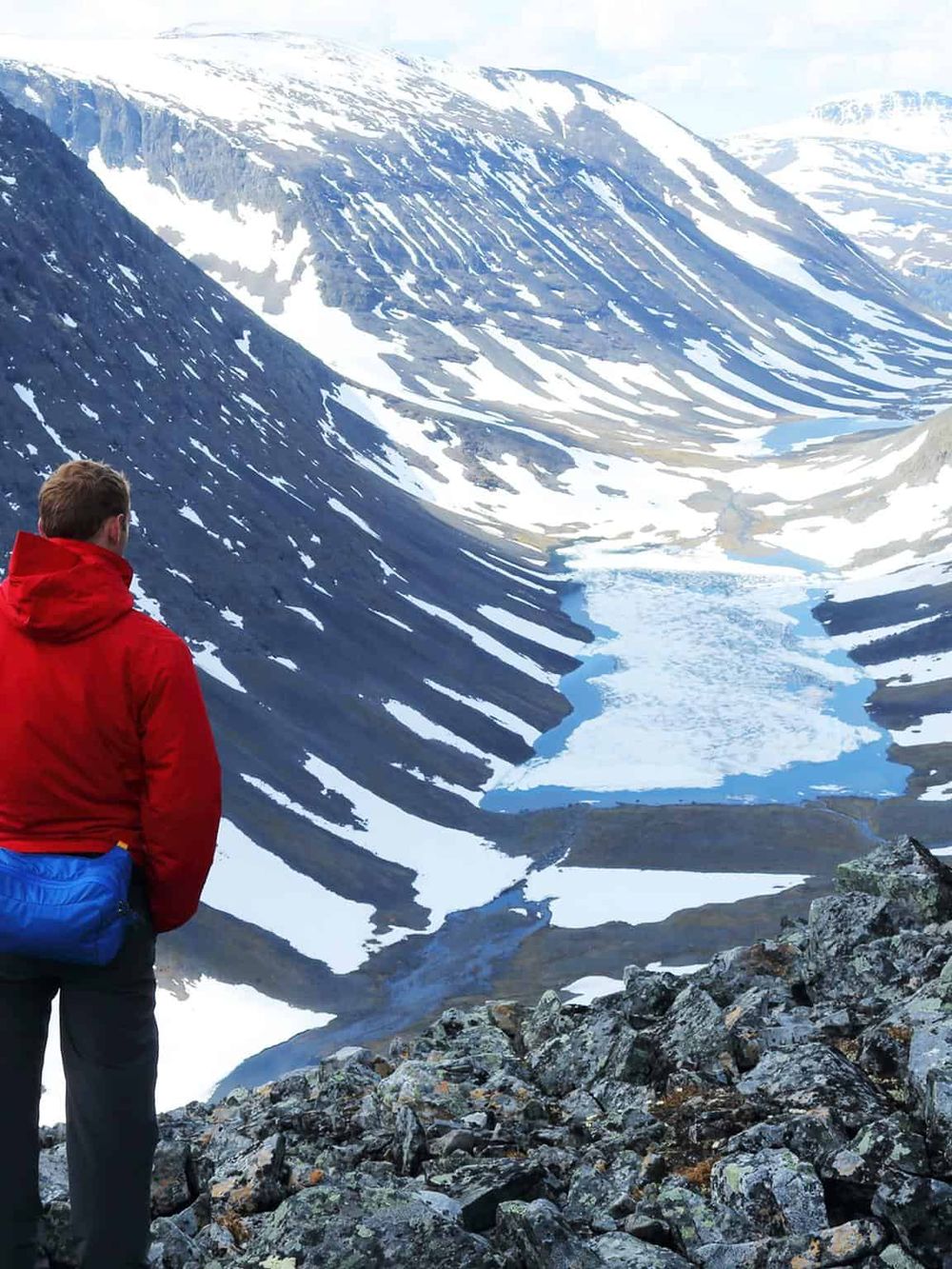 Breathtaking mountain landscape with snow-capped peaks and a glacier, perfect for adventure travel and nature exploration.