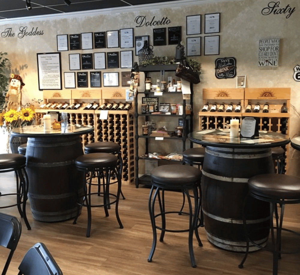 Elegant wine tasting room with wine racks and cozy seating at QuestForDirections.