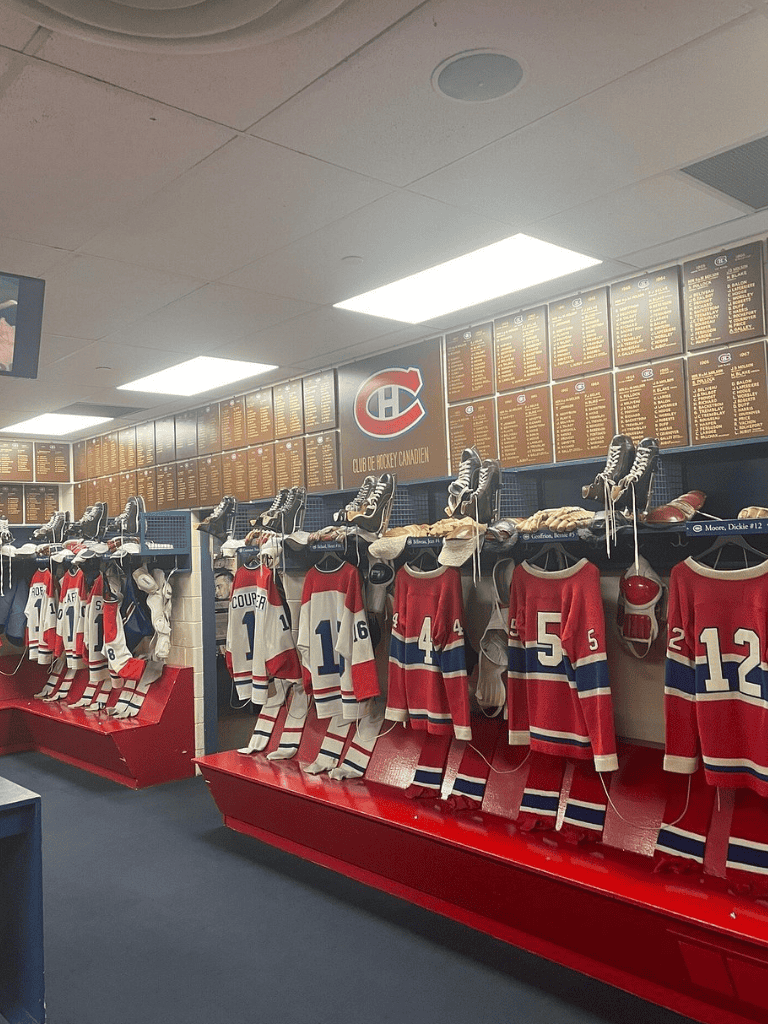 Montreal Canadiens hockey jerseys display at Quest for Directions sports store.