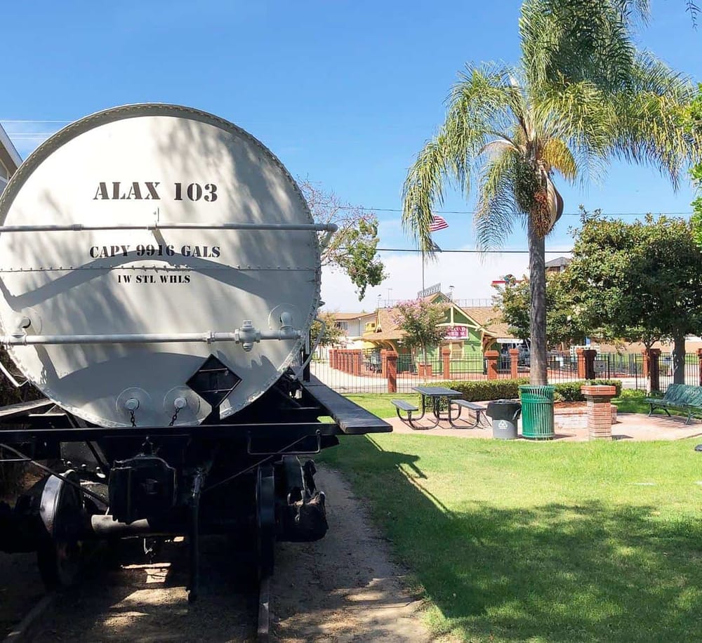 Aerial water tank with city park and palm trees, downtown Los Angeles, California.