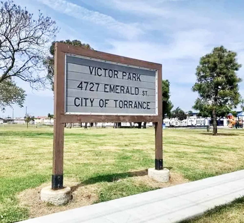 Victorf Park sign at 4727 Emerald St in Torrance, CA, showcasing local park and city landmarks.