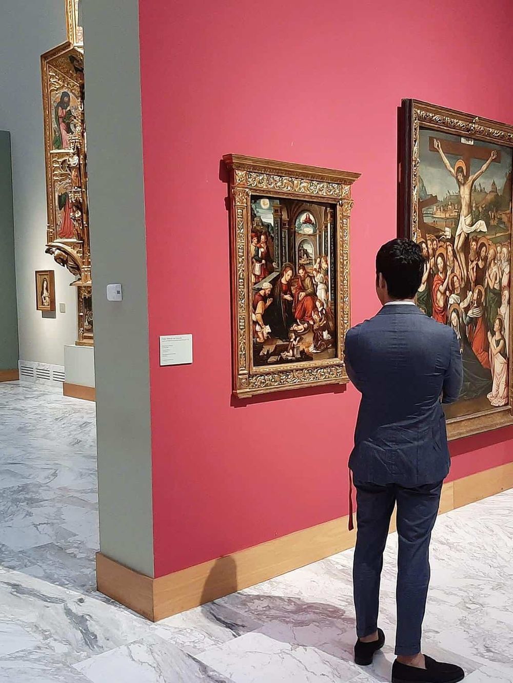 Vivid museum art gallery showcasing religious and Renaissance paintings for cultural exploration.