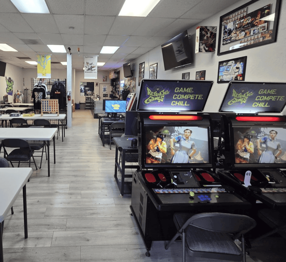 Arcade gaming area at QuestForDirections with retro console games and streetwear apparel store.