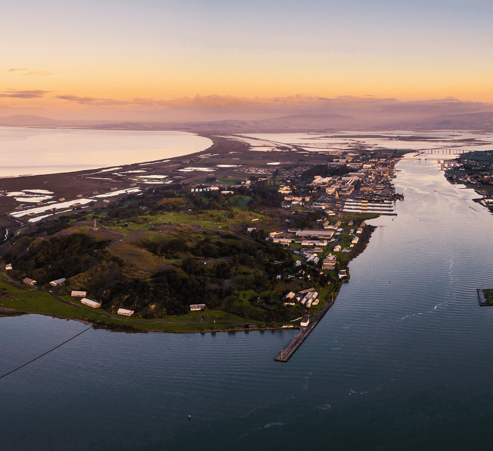 Vibrant aerial view of QuestForDirections coast and waterfront, highlighting navigation and location services.