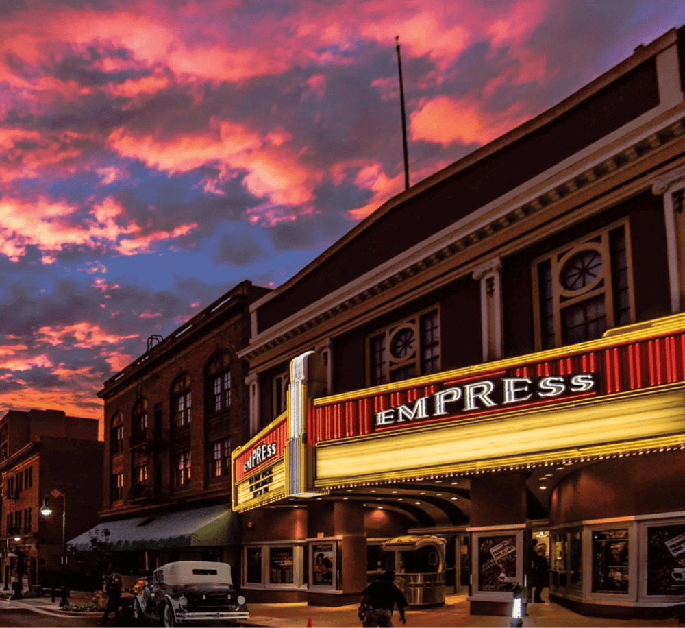Vintage theater marquee at sunset, historic downtown district, local entertainment, QuestForDirections, city nightlife.