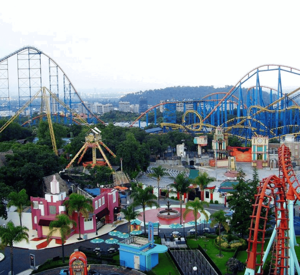 Thrilling rides and roller coasters at Quest for Directions amusement park, offering fun for all ages.