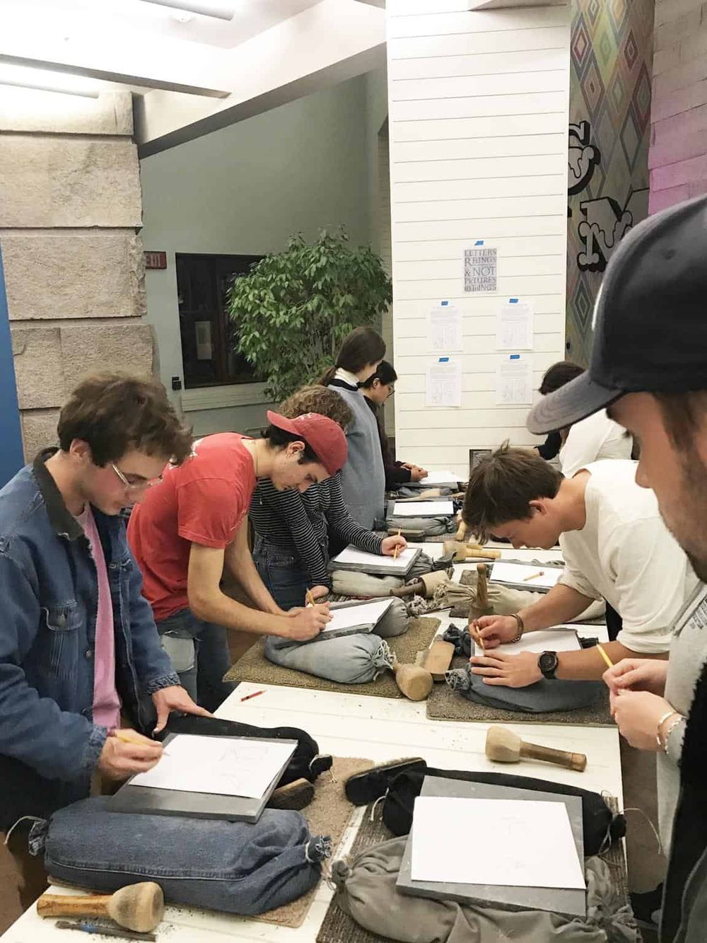 Students engaging in archaeological artifact study at QuestForDirections.