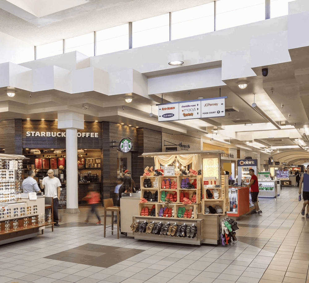 Comfortable indoor shopping mall at QuestForDirections, with popular stores and a Starbucks.