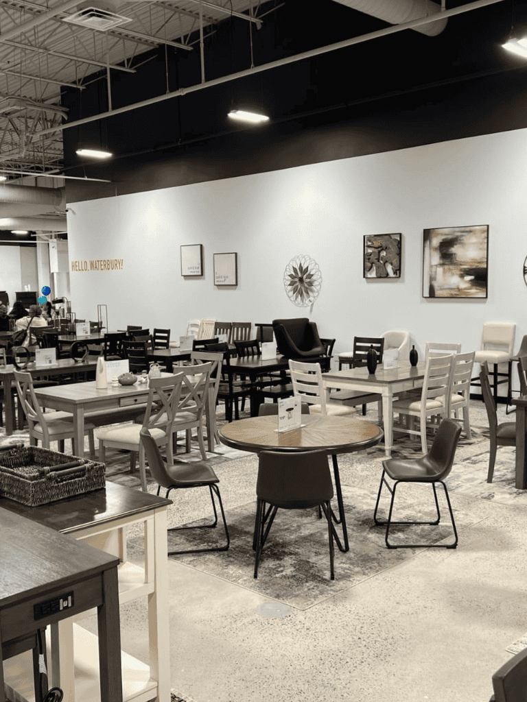 Modern furniture display at QuestForDirections furniture store.