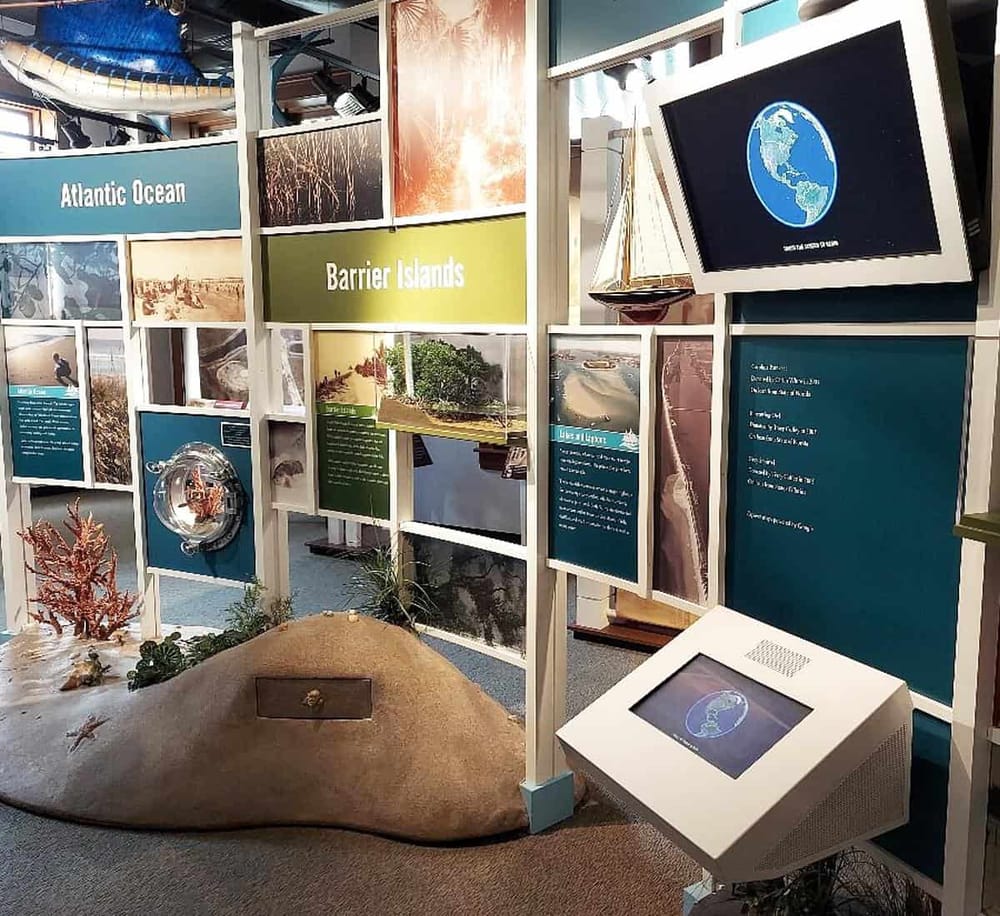 Earth globes at a travel exhibit about Atlantic Ocean and Barrier Islands.