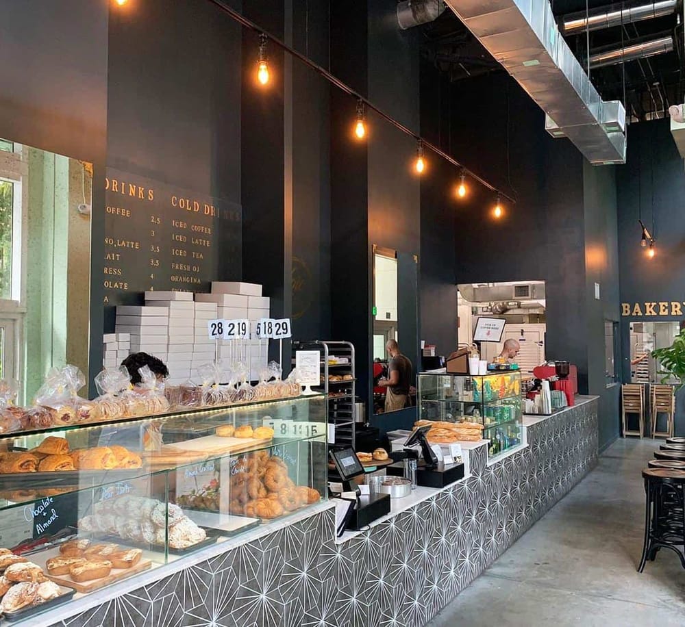 Fresh bakery display with assorted pastries and baked goods at QuestForDirections restaurant.