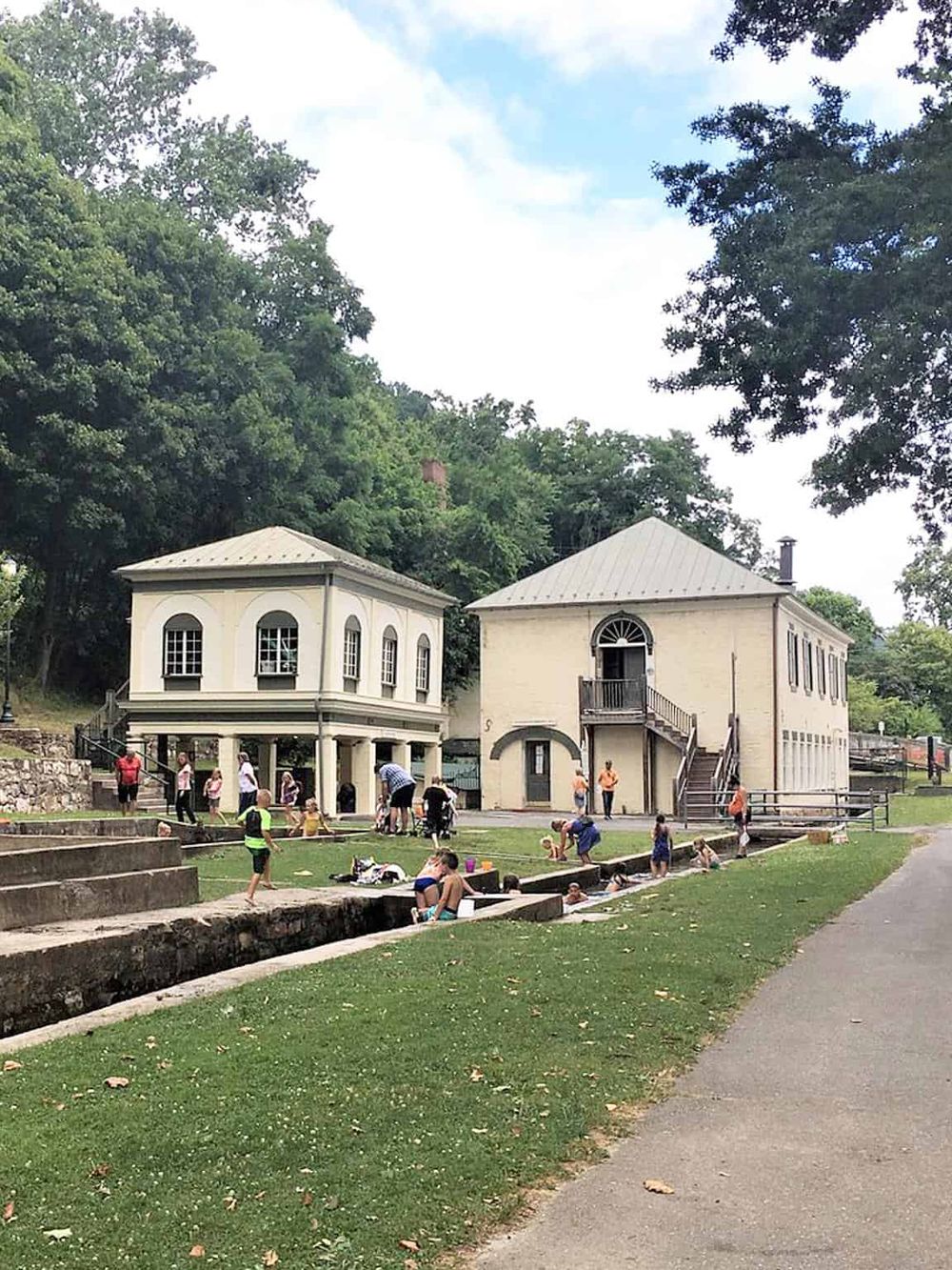 Historic buildings and outdoor water park at Quest for Directions in the Scenic Ozarks.