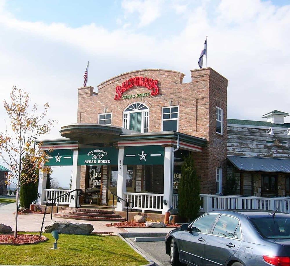 High-quality steak house restaurant with brick exterior and Texas-themed decor, located in QuestForDirections area.