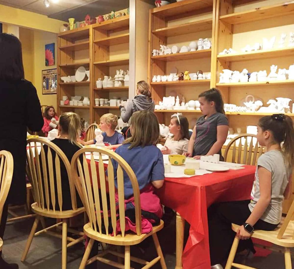 Handmade ceramic figurines workshop for kids at QuestForDirections art studio. Fun, creative activity with pottery glazing and painting.