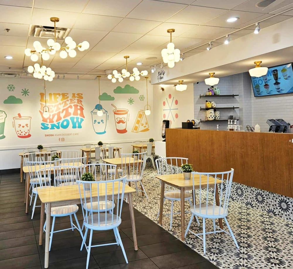 Bright interior of Quest For Directions, a cozy Asian dessert cafe specializing in bubble tea and snow drinks.