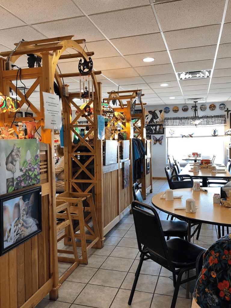 Welcoming restaurant interior with panoramic views, cozy decor, and ample seating for family dining experiences.