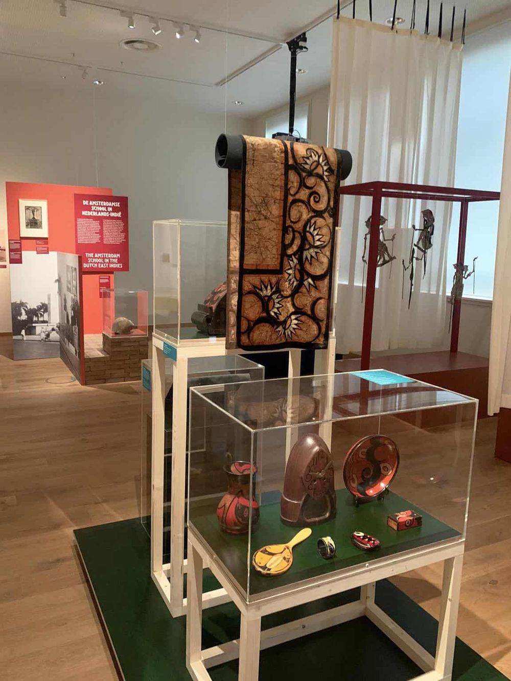 Colors and patterns of Dutch East Indies traditional artifacts displayed at QuestForDirections exhibit.