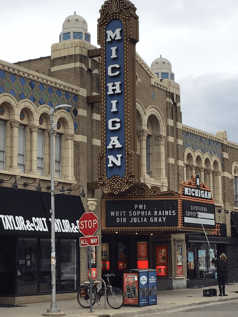 Historic Michigan Theater marquee in Ann Arbor, Michigan, showcasing local events and performances.