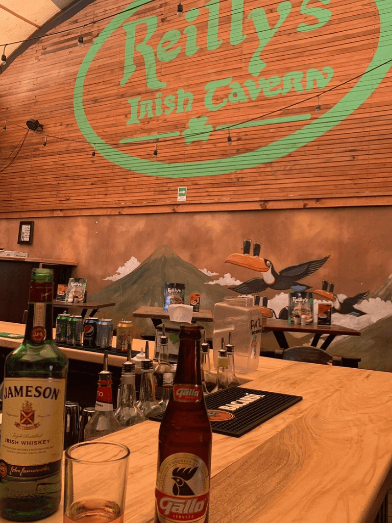 Authentic Irish Tavern decor with lively atmosphere and local drinks at Reilly's Irish Tavern.