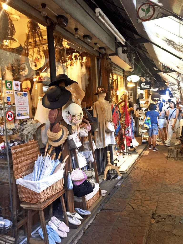 Colorful Boutique Shops on a Bustling Street in Thailand.