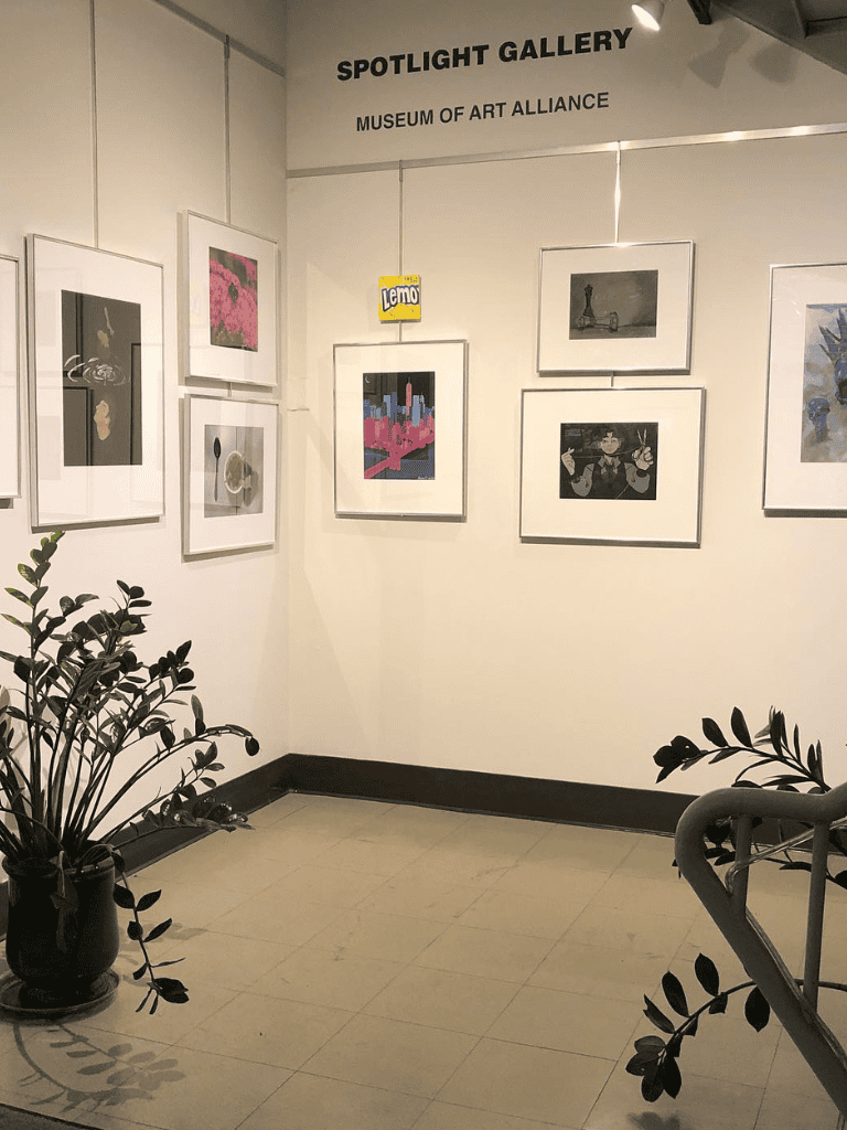 Vibrant art gallery display at QuestForDirections museum showcasing colorful modern artworks.