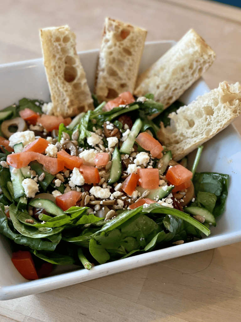 Fresh vegetable salad with breadsticks, nutritious and healthy meal options at QuestForDirections.